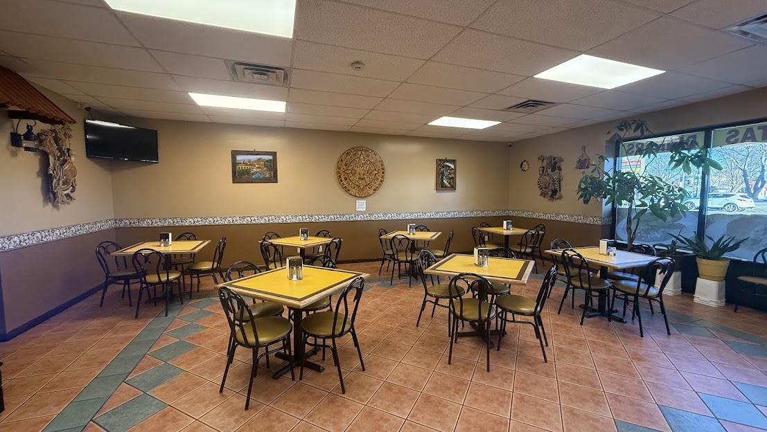 Bright, family-friendly dining room at Super Burrito Aguascalientes